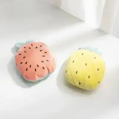 Pink watermelon and yellow pineapple plush pillows, perfect for children's room decor or as cozy accessories. Soft, colorful, and cute, these fruit-shaped cushions add fun to any space.