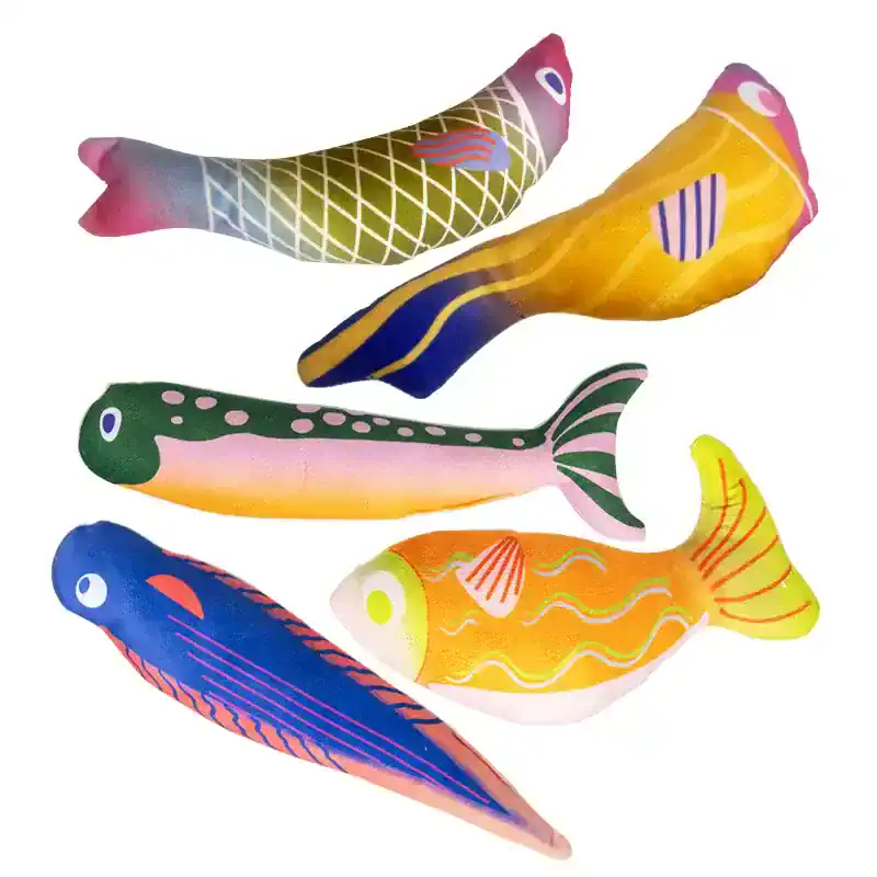 Colorful decorative fish-shaped cushions, perfect for adding vibrant ocean-inspired decor to bedrooms or living spaces, available at Monalisa Store for home and gift collectibles.