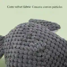 Soft, textured gray fabric of a plush stuffed animal on Monalisa Store's website with the label