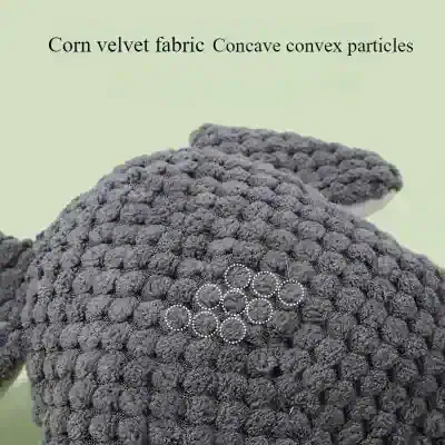 Soft, textured gray fabric of a plush stuffed animal on Monalisa Store's website with the label