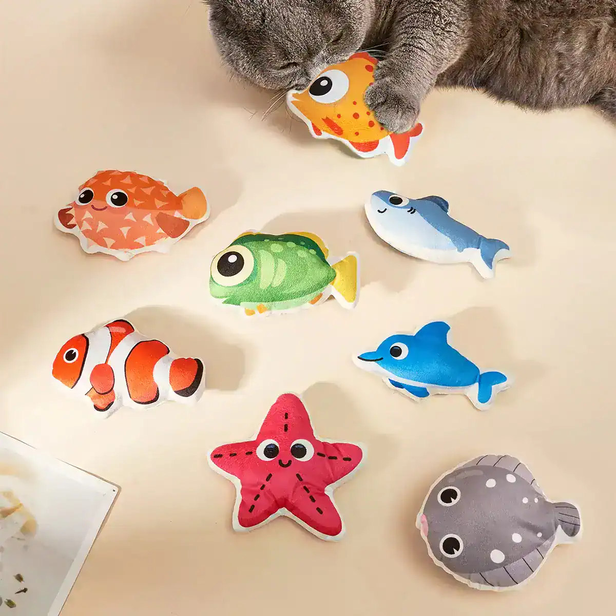 Colorful plush ocean animal toys for kids, including fish, starfish, and dolphin, perfect for educational play and sensory development. Bright, adorable designs ideal for children’s toys and nursery decor.
