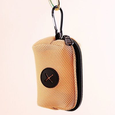 Carabiner keychain with beige protective case, ideal for eye care accessories at Monalisa Store.