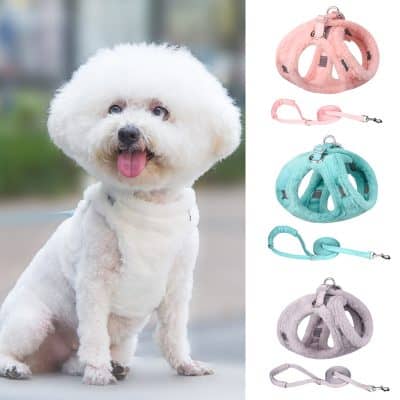 Soft plush pink pet harness with adjustable straps and leash attachment, ideal for small dogs and cats. Stylish, comfortable, and secure for everyday walks.
