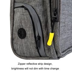 High-quality grey backpack with zipper reflective strip for safety, durable material, and ample storage. Suitable for travel, school, and daily outdoor activities.