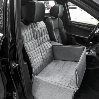 Compact pet car seat with protective side walls and soft upholstery for safe and comfortable travel. Ideal for small dogs or cats during car rides, ensuring pet safety and comfort on the go.