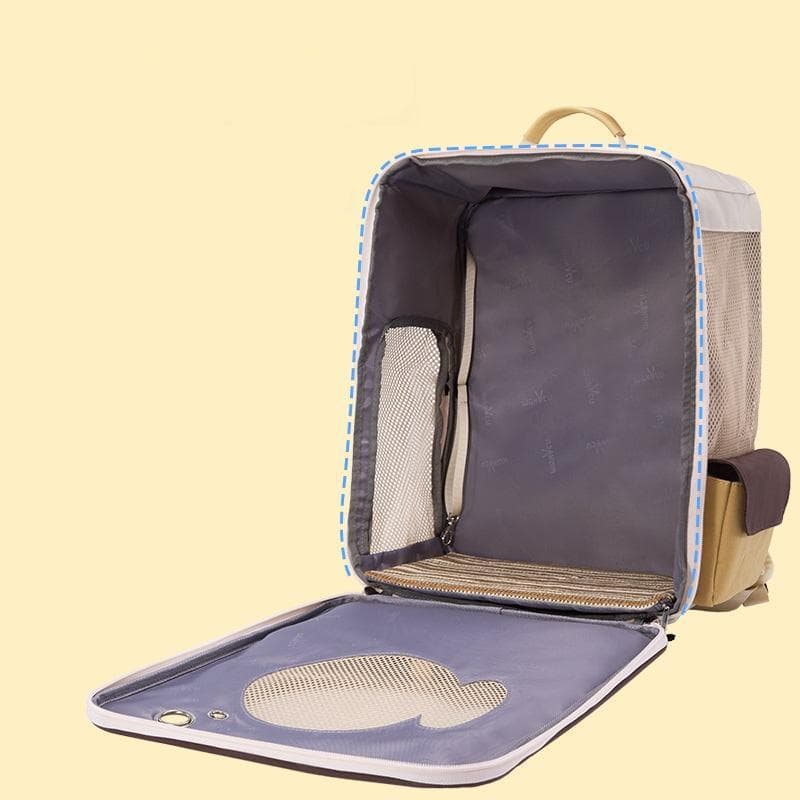 Light beige travel backpack with an open, organized interior and a built-in shoe compartment, ideal for organizing travel essentials and footwear. Perfect for business or leisure trips.