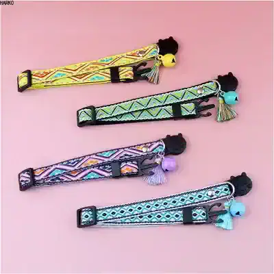 Colorful embroidered pet collars with bell charms and tassels, ideal for small dogs or cats, available at Monalisa Store for fashionable pet accessories.