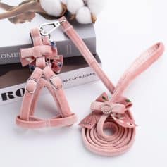 Pink pet harness and leash set with floral bows, perfect for small dogs and cats, stylish and comfortable pet accessories, available at Monalisa Store.