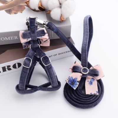 Stylish denim dog collars with bows and rhinestone embellishments, perfect for small dogs and puppies. Durable, adjustable, and designed for comfort and fashion.