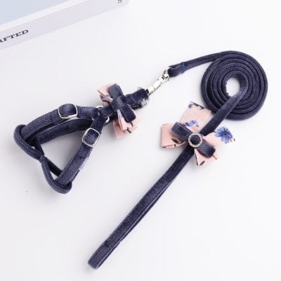 Elegant navy blue pet harness and leash set with pink floral bows for small dogs or cats – fashionable and comfortable dog accessories from Monalisa Store.