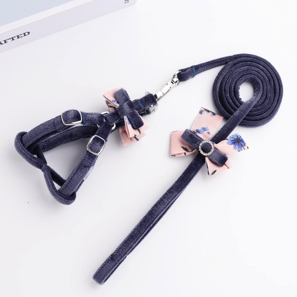 Elegant navy blue pet harness and leash set with pink floral bows for small dogs or cats – fashionable and comfortable dog accessories from Monalisa Store.