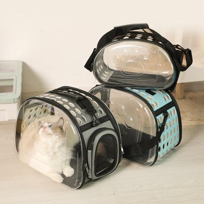 Vacuum-sealed pet carriers with transparent bubble windows, ideal for traveling with cats, lightweight and portable design, perfect for pet comfort and safety during trips.