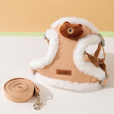 Soft beige children's backpack with white faux fur trim and a cute bear face patch, perfect for kids and preschoolers. Includes a matching detachable strap for easy carry.