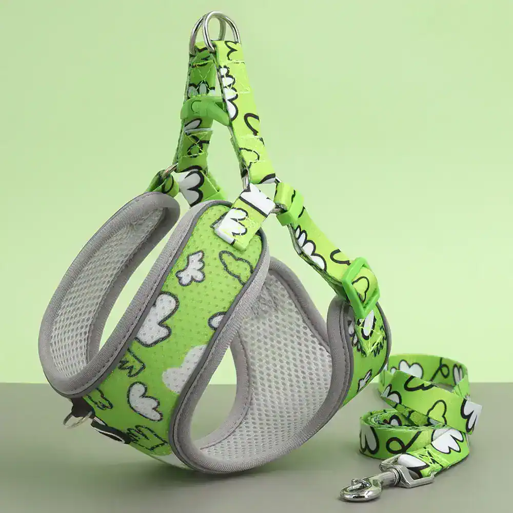 Bright green pet harness with cloud pattern, adjustable buckle, and metal leash clip, ideal for safe dog walking and training. Stylish and comfortable pet accessory from Monalisa Store.