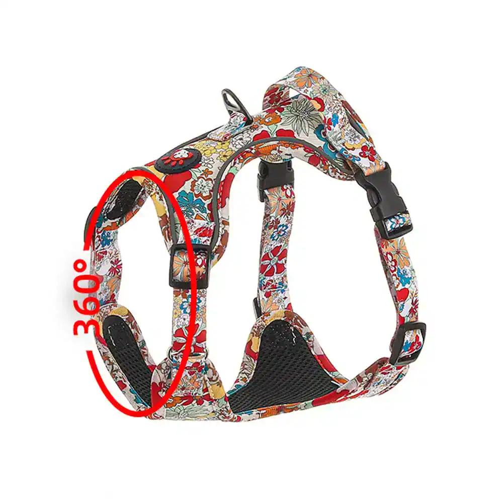 Brightly colored floral pet harness with adjustable straps and breathable mesh for secure and comfortable outdoor walks. Designed for small to medium dogs, with a 360° strap adjustment for perfect fit.