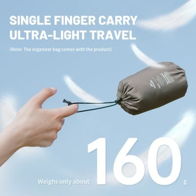 Light travel single finger carry ultra-light backpack for travel and outdoor activities, durable and compact, great for portable convenience, displayed on blue sky background with floating feathers.