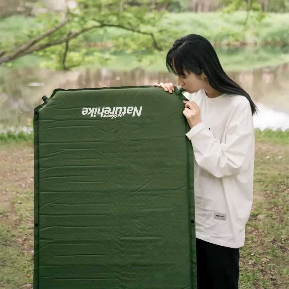 Sleeping cot, outdoor camping mattress, portable camping bed, waterproof sleeping mat, lightweight recreational sleeping pad.