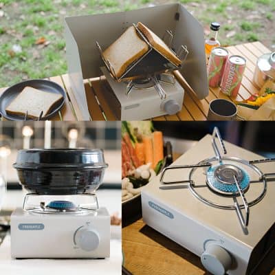 Freshly toasted bread on a portable grill for outdoor snack prep, surrounded by beverages and snacks at Monalisa Store.