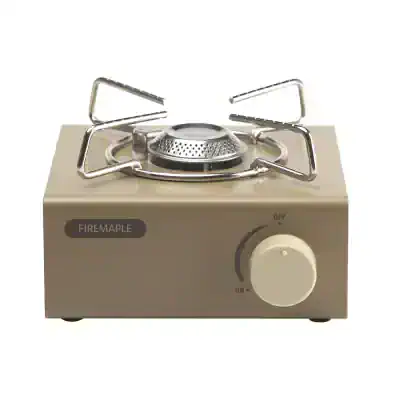 Gas stove burner with stainless steel grate and beige control panel, ideal for mobile or small kitchen setups.
