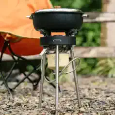 Portable camping stove with cookware for outdoor cooking and camping adventures. Compact, durable, and perfect for outdoor enthusiasts and hiking trips to prepare delicious meals in nature.