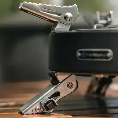 Precision-toned surgical instrument on a clean, industrial work surface, highlighting craftsmanship and quality in medical device manufacturing at Monalisa Store.