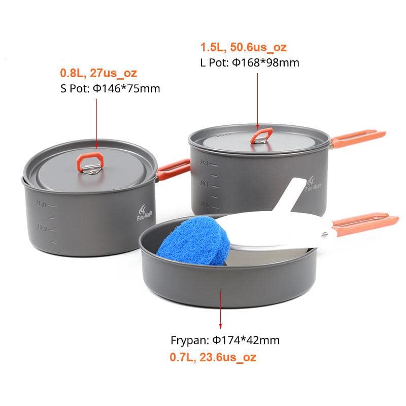 Durable camping cookware set with three grey pots of varying sizes, orange handles and lids, ideal for outdoor cooking and travel.