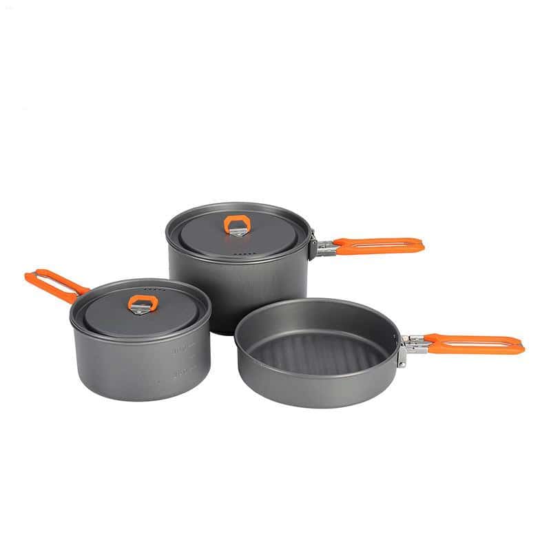 Non-stick cookware set with orange handles, ideal for camping and outdoor cooking, durable aluminum construction with lids, easy to clean and versatile for all your cooking needs.