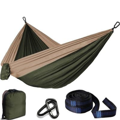 Lightweight camping hammock with carrying bag, carabiners, and strap set for outdoor adventure. Perfect for relaxing in nature, camping, hiking, and backpacking trips. Durable and easy to set up.