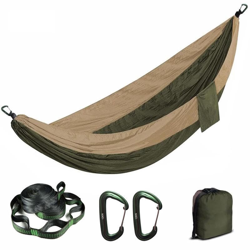 Lightweight camping hammock with tree straps, carabiners, and storage bag for outdoor relaxation and travel. Durable and easy to set up. Perfect for camping, hiking, and outdoor adventures.