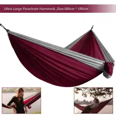 Lightweight red and gray outdoor parachute hammock, 300cm x 190cm, ideal for camping and relaxation; quick setup and durable material.