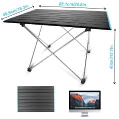 Aluminum folding camping table with black slatted surface, lightweight and portable, ideal for outdoor activities, picnics, and travel; sturdy metal legs with non-slip feet.