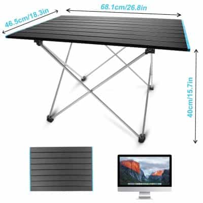 Aluminum folding camping table with black slatted surface, lightweight and portable, ideal for outdoor activities, picnics, and travel; sturdy metal legs with non-slip feet.