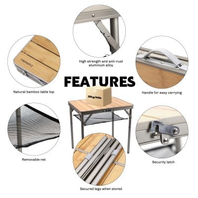 Natural bamboo table top for portable outdoor cooking or serving; sturdy aluminum alloy frame with secure storage and easy-to-carry handle.