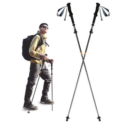 Sturdy trekking poles and a hiker with backpack and sunglasses, ready for outdoor adventure. Perfect for trekking, hiking, and mountain exploration to ensure stability and safety.