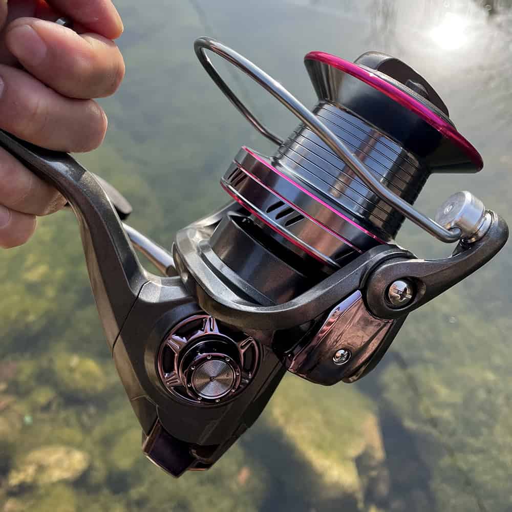 High-quality fishing reel, Monalisa Store, stylish fishing gear, durable fishing equipment, modern outdoor fishing gear for enthusiasts.