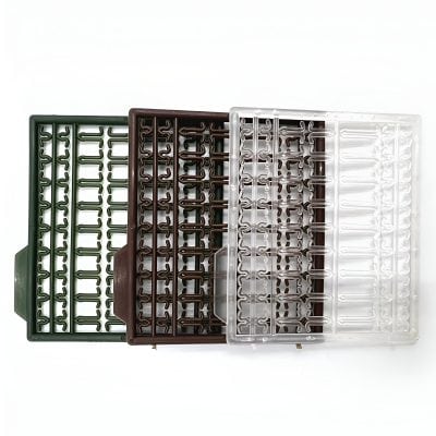 Colorful plastic eyeglass lens storage racks.