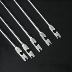 Precision dental instruments for oral care and dental procedures, showcasing metal tips on black background.