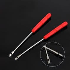 Precision eyelash extension tweezers with red handles for professional beauty and cosmetic applications.