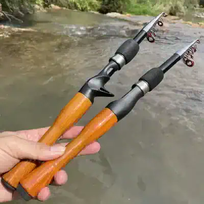 Stainless steel fishing rods with wooden handles for freshwater fishing, lightweight and durable fishing gear. Crafted for anglers enjoying river and stream fishing adventures.