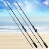 High-quality fishing rods on beach with ocean view, suitable for saltwater and freshwater fishing, featuring ergonomic handles and durable construction, perfect for angling enthusiasts.