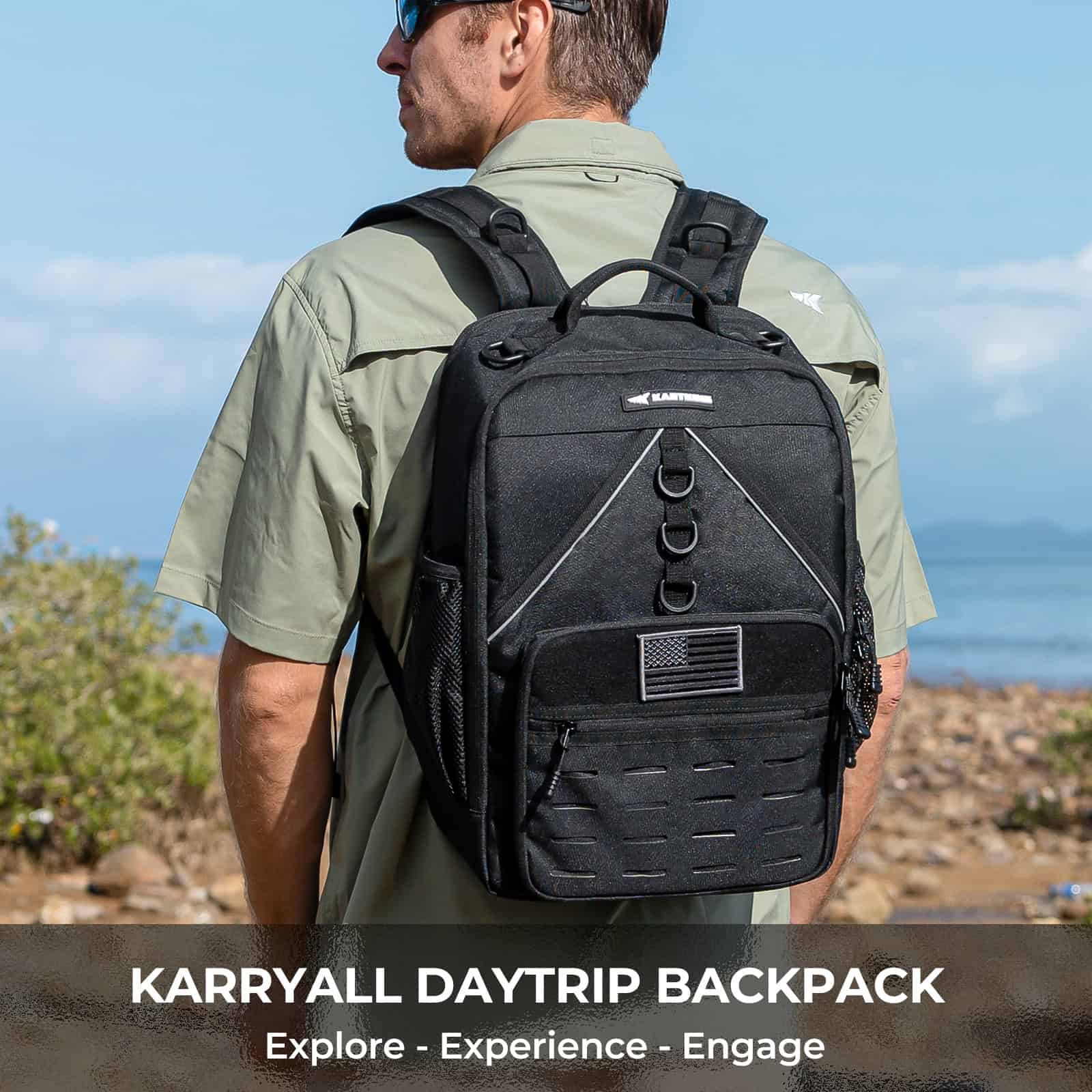 Durable black Karryall daytrip backpack with multiple compartments, ideal for travel, outdoor activities, and everyday use, featuring American flag patch and ergonomic design.