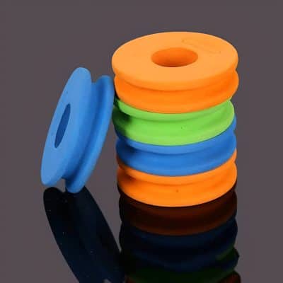 Multicolored foam yoga discs for exercise and physical therapy, flexible balance training equipment, gym accessory for core strength and stability, vibrant workout accessories from Monalisa Medical.