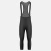Performance black tapered athletic overalls with breathable mesh back for sports and fitness activities.