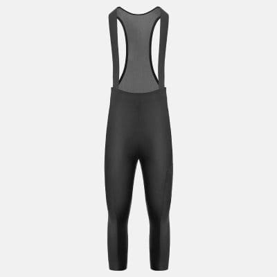 Performance black tapered athletic overalls with breathable mesh back for sports and fitness activities.