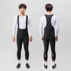 Men's compression sportswear with suspenders, black and white athletic clothing, breathable fabric fit for running and cycling.
