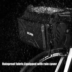 Waterproof rainproof fabric bike bag with rain cover for cycling adventures.