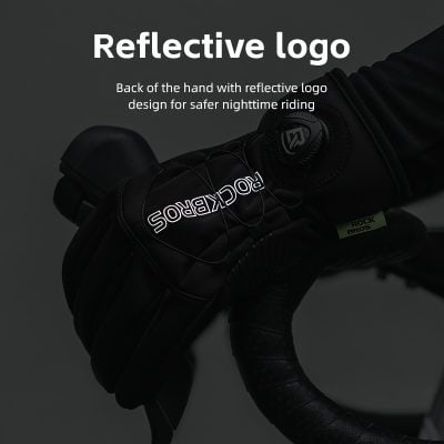 Reflective logo on motorcycle gloved hand for enhanced safety during nighttime riding.