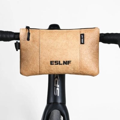 Versatile bike handlebar bag with waterproof design, perfect for outdoor cycling and travel storage, featuring adjustable straps for secure fit and easy access to essentials.