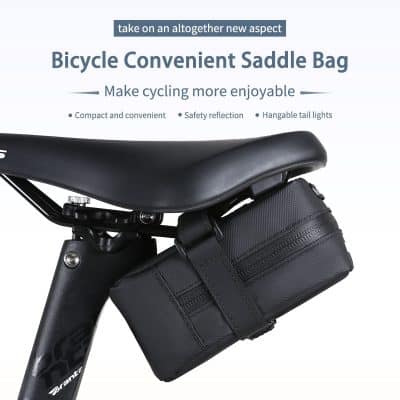 Bicycle saddle bag attached beneath a black bike seat, designed for cycling convenience, safety reflection, and hangable tail lights, perfect for storing essentials during bike rides.