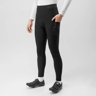 Black athletic leggings with mesh panels and pocket, ideal for sports and activewear. Perfect for fitness enthusiasts seeking comfort and style during workouts.
